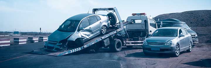 Car accident attorney with tow truck